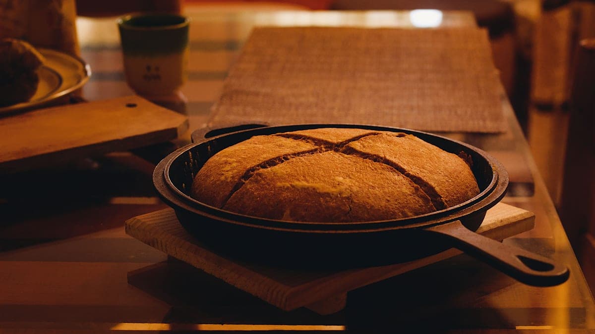 Golden cornbread baked in a cast iron skillet